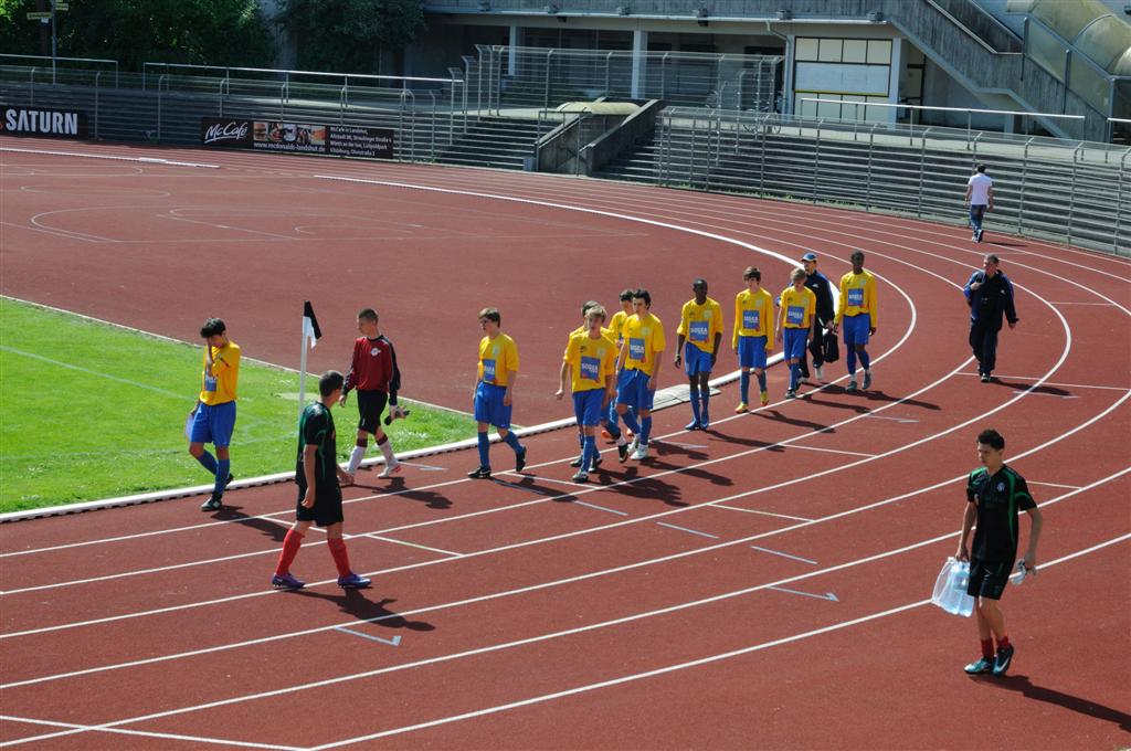 L'équipe de l'AFC arrive sur le terrain pour la finale